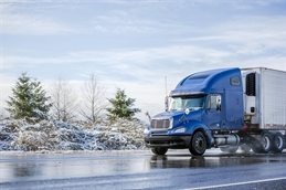 blue truck in snow iStock-1128372290