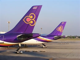 Tails_of_two_Thai_Airways_aircraft_at_VTBD