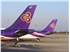 Tails_of_two_Thai_Airways_aircraft_at_VTBD