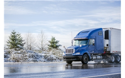 blue truck in snow iStock-1128372290
